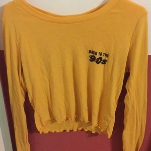 Black and yellow cropped “back to the 90’s” shirt